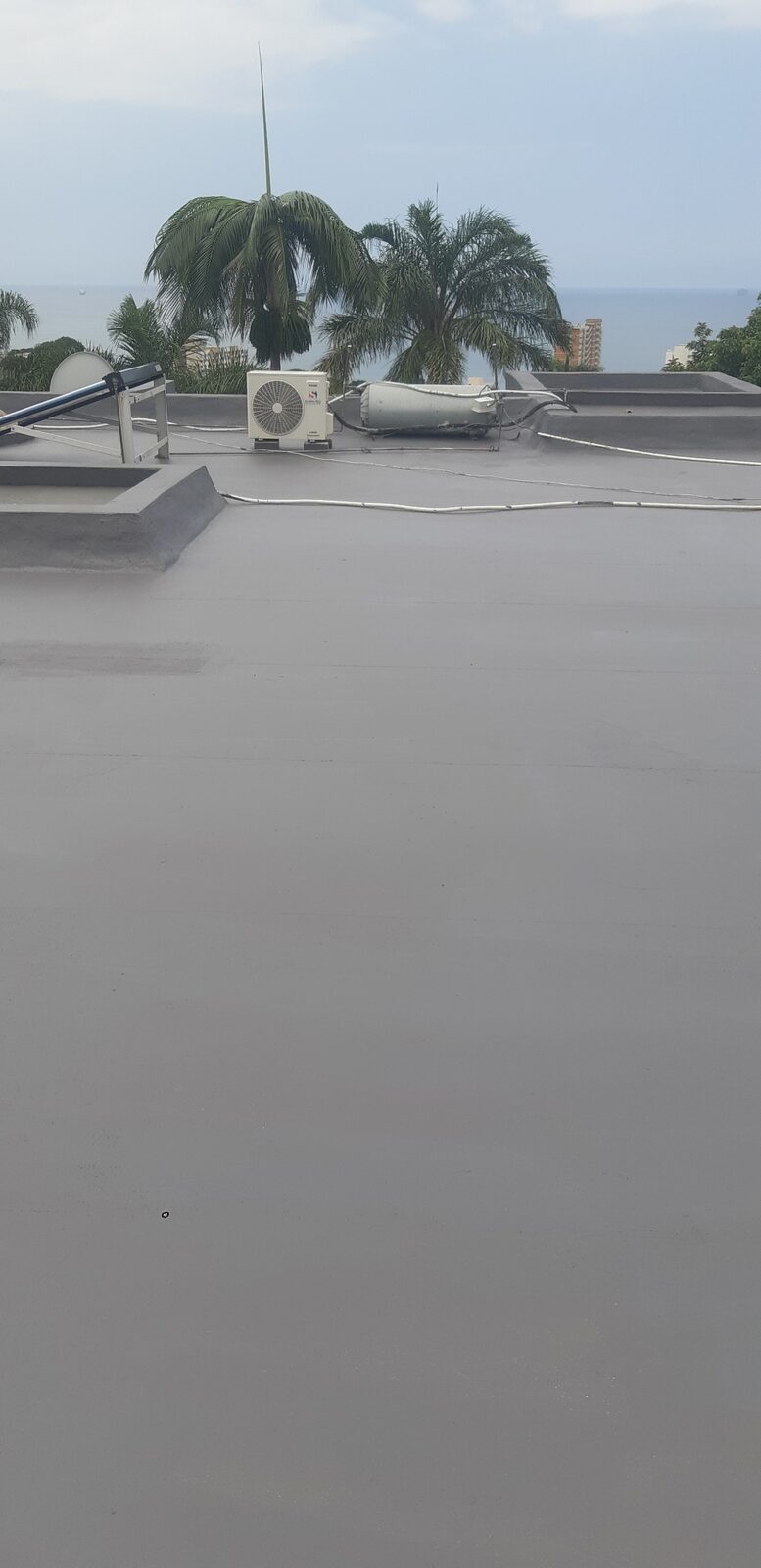 Waterproofed flat roof — clear sky